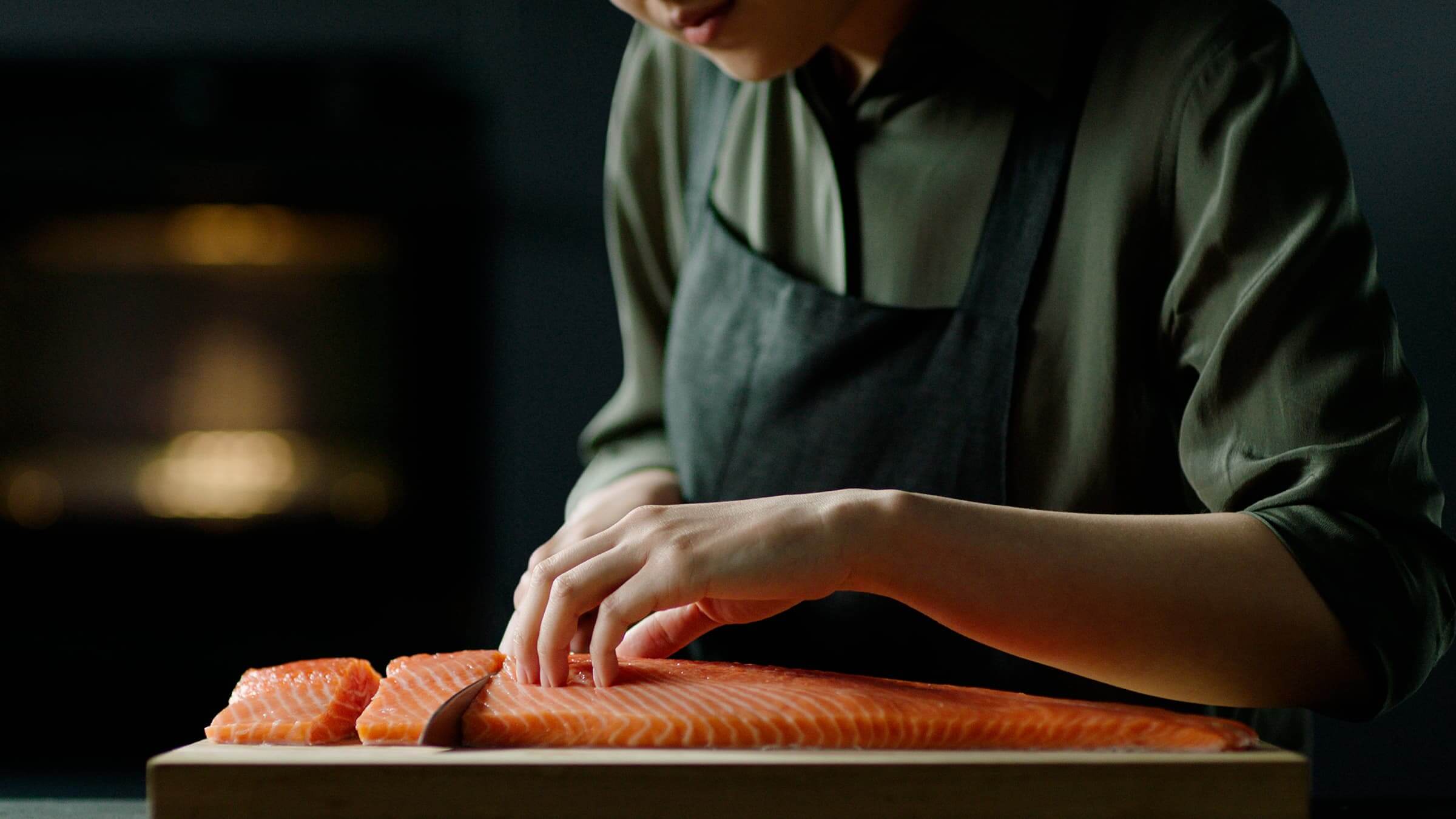 Chef preparing salmon